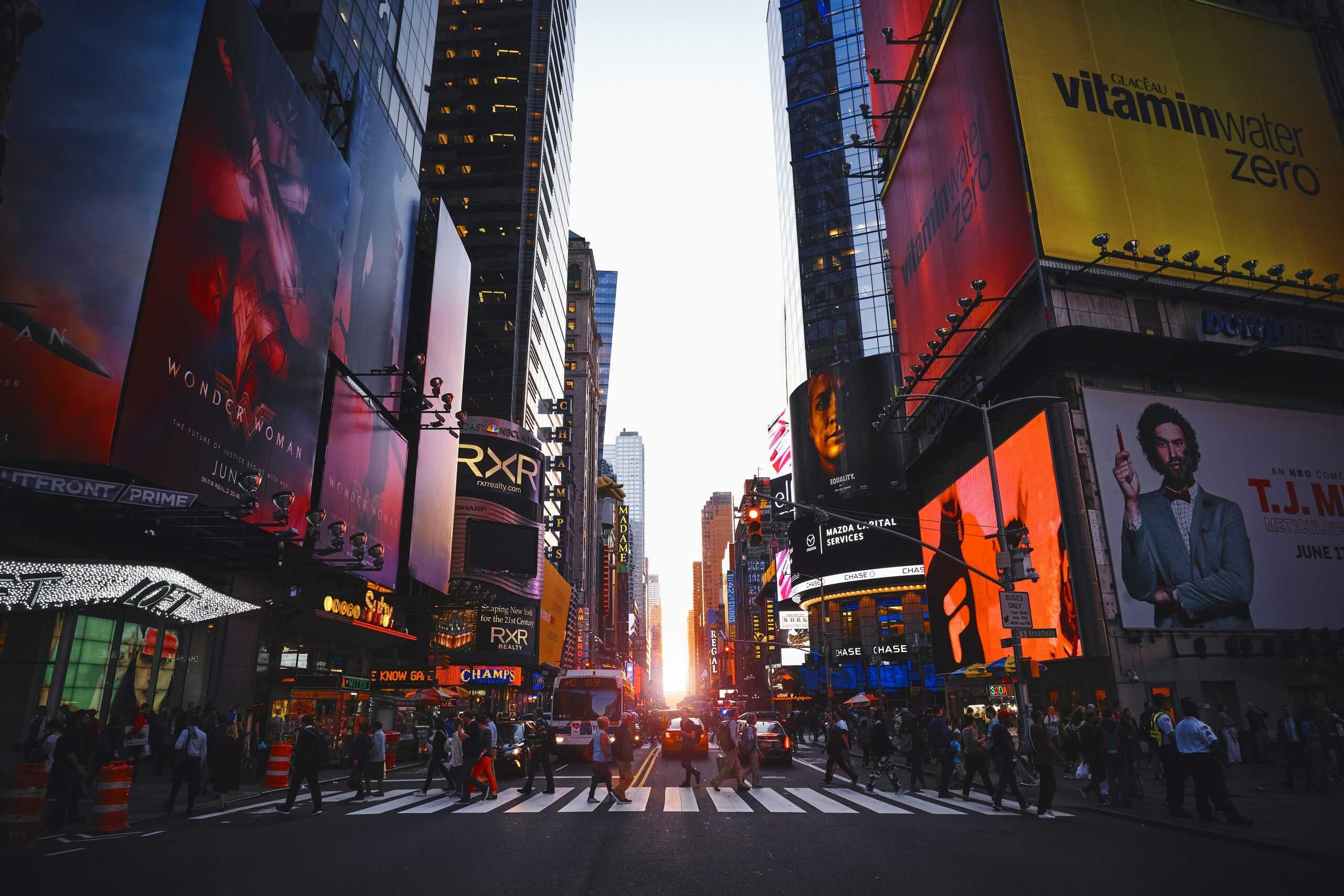 Vibrant Times Square billboard advertisements and urban cityscape in New York City.