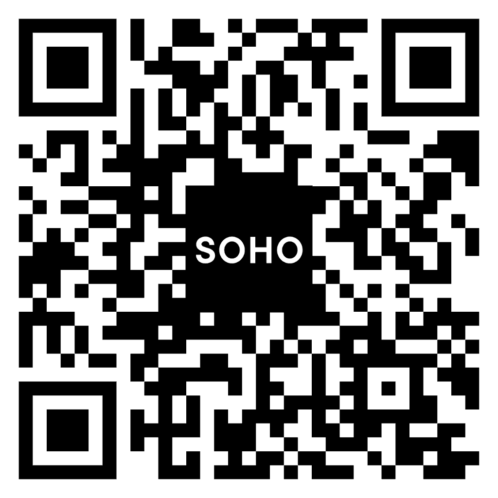 Modern SOHO workspace with sleek design and creative atmosphere.